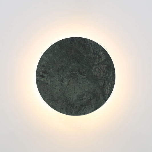 Round stone wall light fixture on a white background